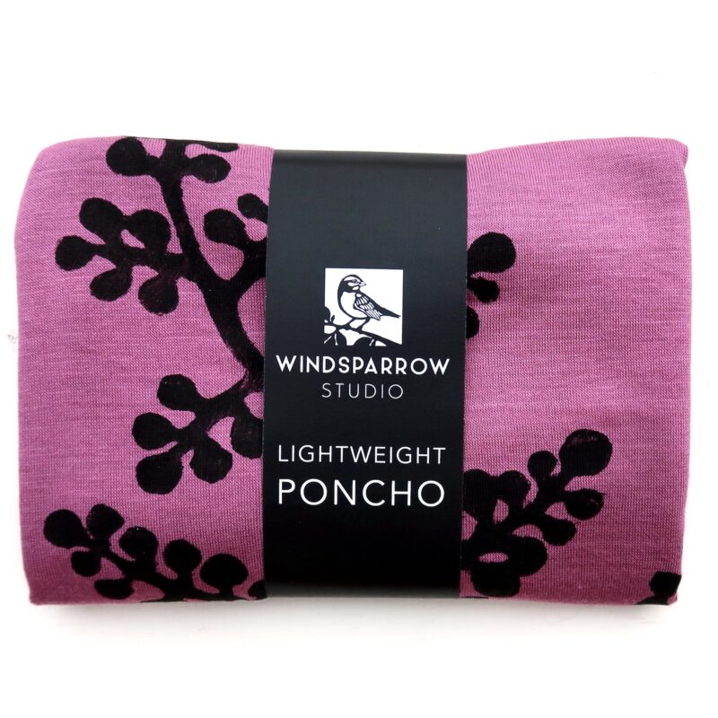 Berry Branch poncho (black ink) in packaging