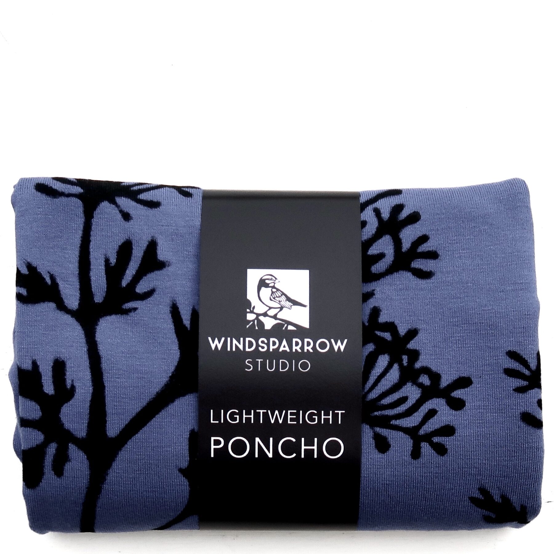 Parsley poncho (black ink) in packaging